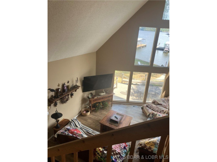 > A wall of windows and vaulted ceilings. Main level living! Big - photo 31