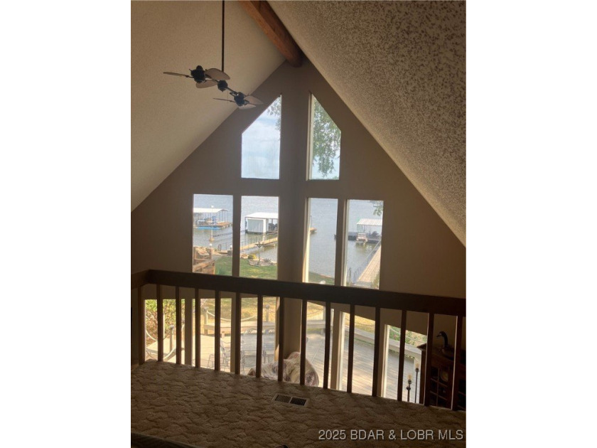 > A wall of windows and vaulted ceilings. Main level living! Big - photo 32