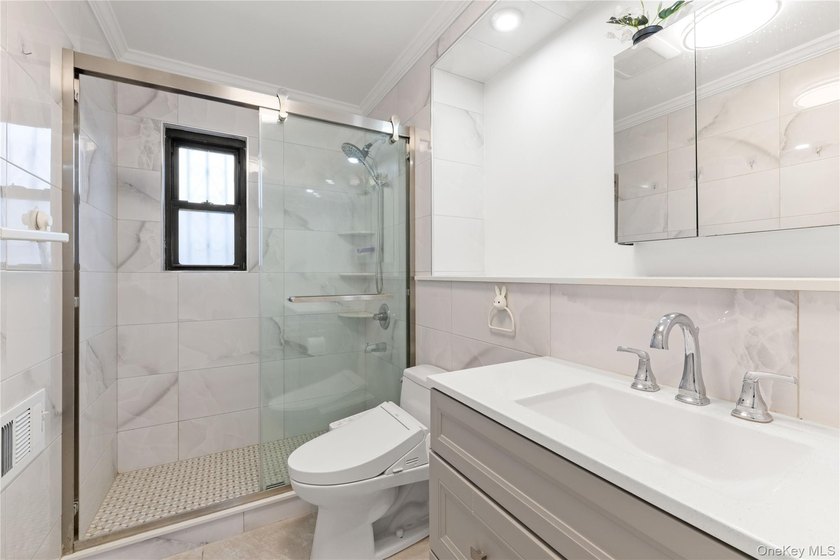 Welcome to 153-20 58th Avenue, a well-maintained 3-bedroom - photo 3