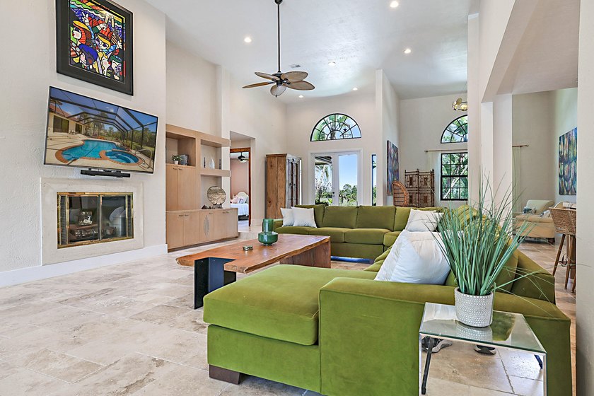 Numerous luxury upgrades! Newer roof, complete impact - photo 11
