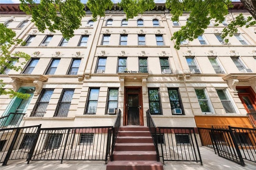 Rare oversized 8-family investment property in the heart of - photo 2
