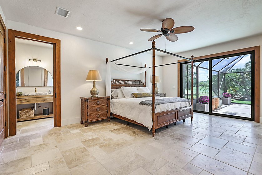 Numerous luxury upgrades! Newer roof, complete impact - photo 30