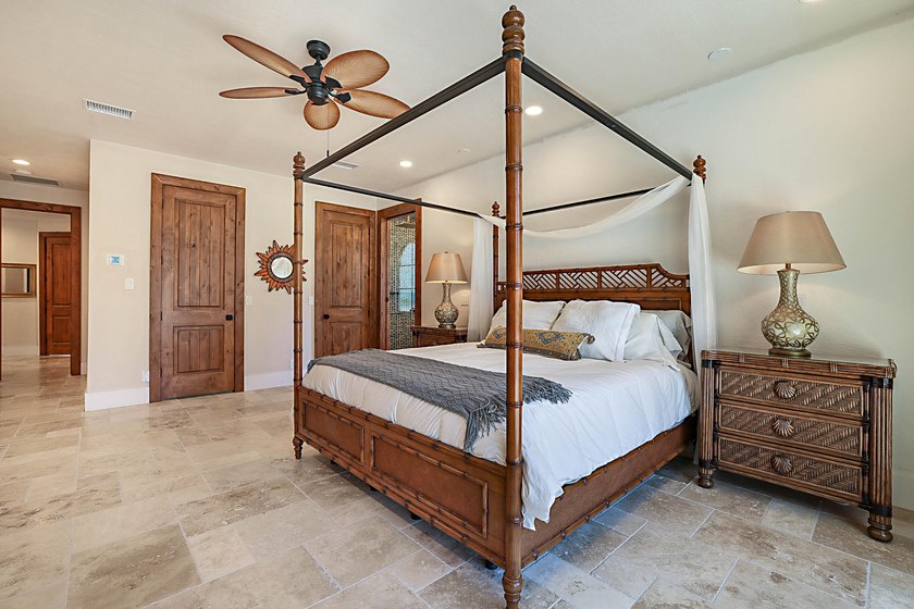 Numerous luxury upgrades! Newer roof, complete impact - photo 31