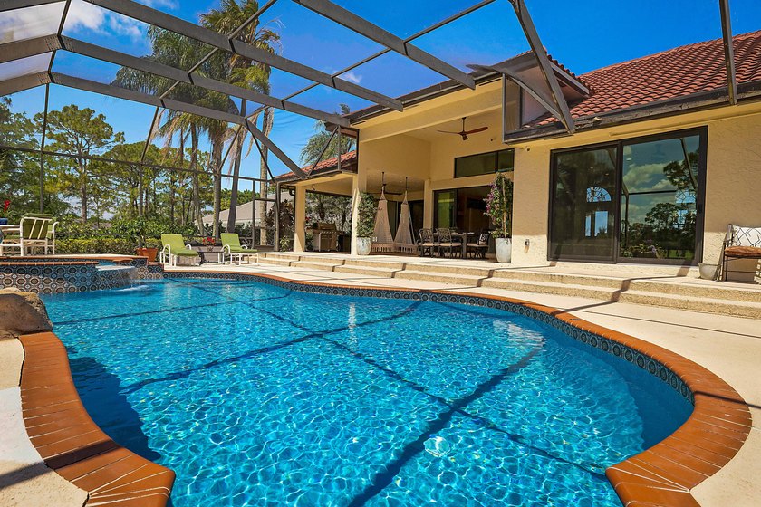 Numerous luxury upgrades! Newer roof, complete impact - photo 46