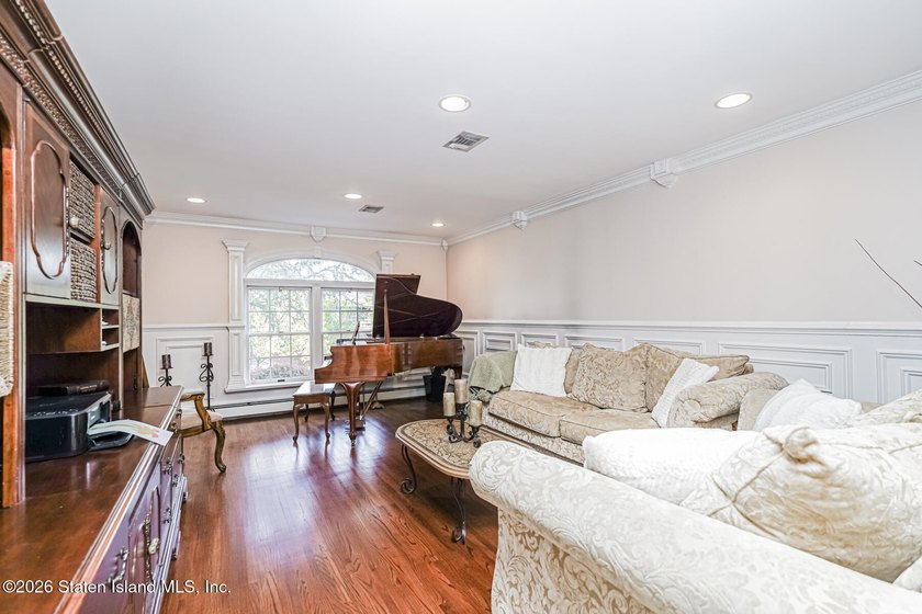 Welcome to 699 Ionia Avenue, a stunning brick-front center hall - photo 8