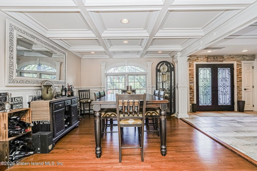 Welcome to 699 Ionia Avenue, a stunning brick-front center hall - photo 9