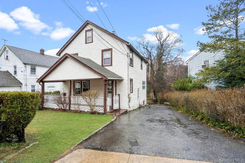 Welcome to 43 Van Nostrand Avenue, an updated 3-bedroom - photo 3