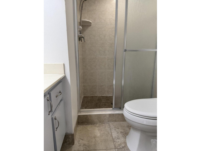 Welcome to this bright 2-bedroom, 2-bathroom condominium nestled - photo 8