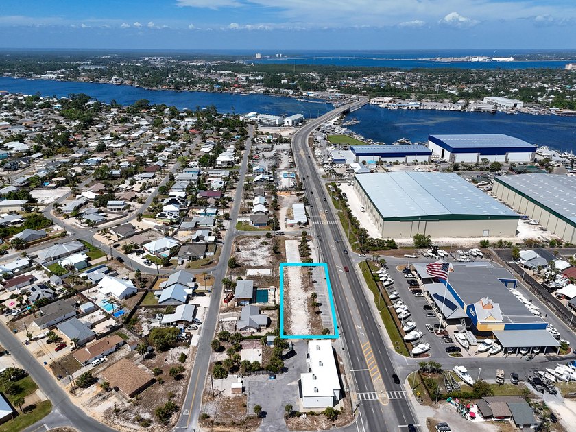 The site features 225 feet of frontage and is zoned C-3, which - photo 2