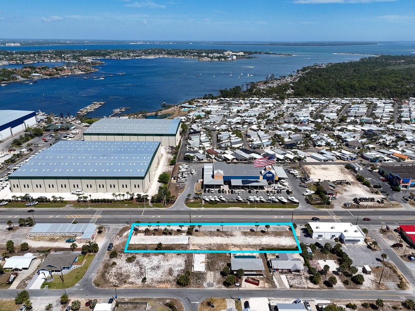 The site features 225 feet of frontage and is zoned C-3, which - photo 4
