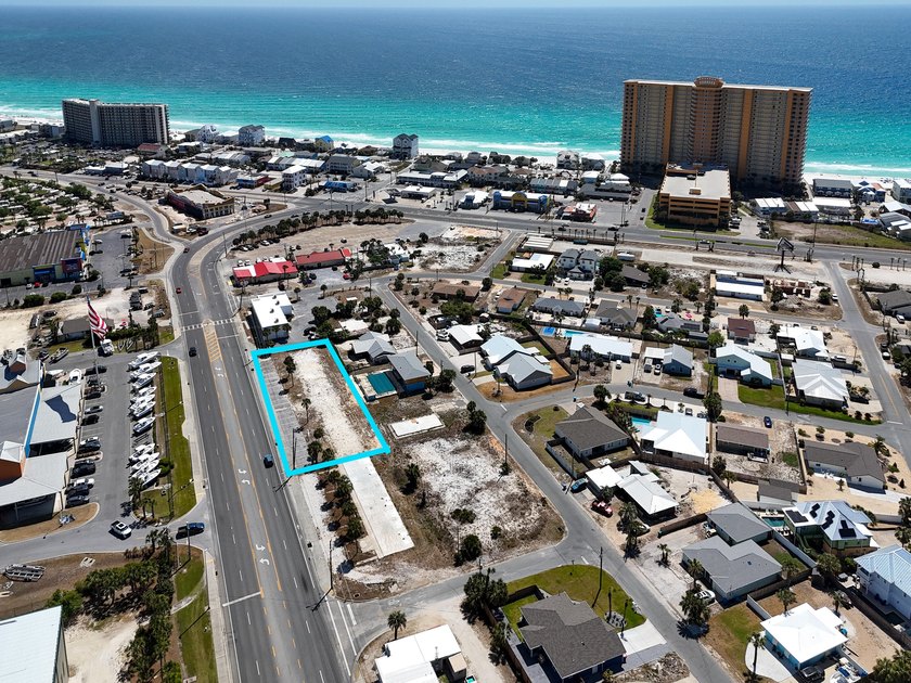 The site features 225 feet of frontage and is zoned C-3, which - photo 8