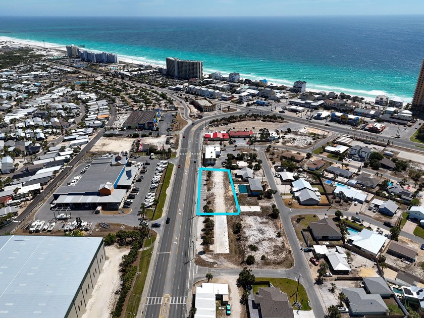 The site features 225 feet of frontage and is zoned C-3, which - photo 9