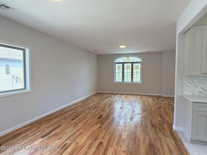 THIS SPACIOUS, DETACHED TWO-FAMILY '7 OVER 7'HOME LOCATED IN THE - photo 4