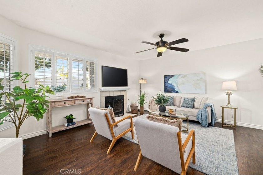 Located within the gated community of Seawind Cove, this - photo 2