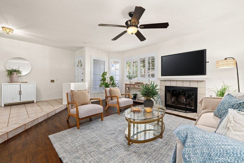 Located within the gated community of Seawind Cove, this - photo 3