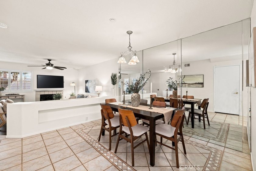 Located within the gated community of Seawind Cove, this - photo 9