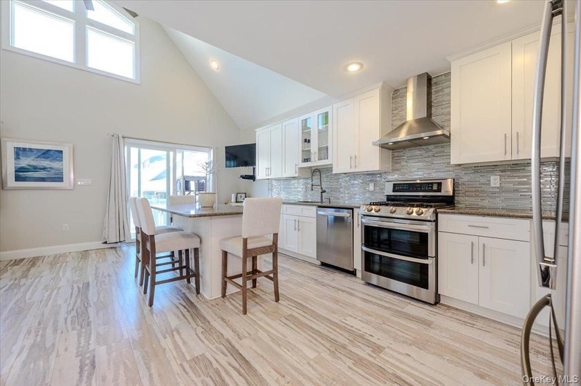 Welcome to this Pristine, Renovated, FEMA-Compliant Coastal - photo 5