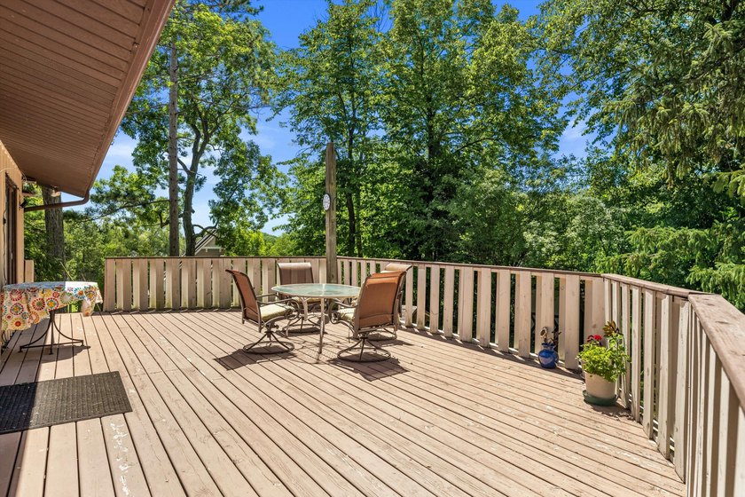 Unique property tucked away on a private wooded lot in a quiet - photo 16