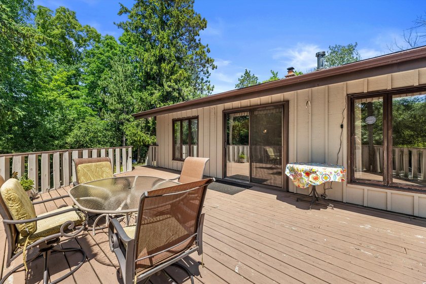 Unique property tucked away on a private wooded lot in a quiet - photo 18