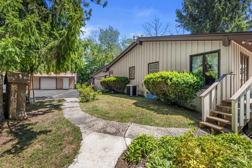Unique property tucked away on a private wooded lot in a quiet - photo 19
