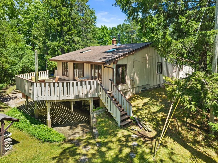 Unique property tucked away on a private wooded lot in a quiet - photo 21