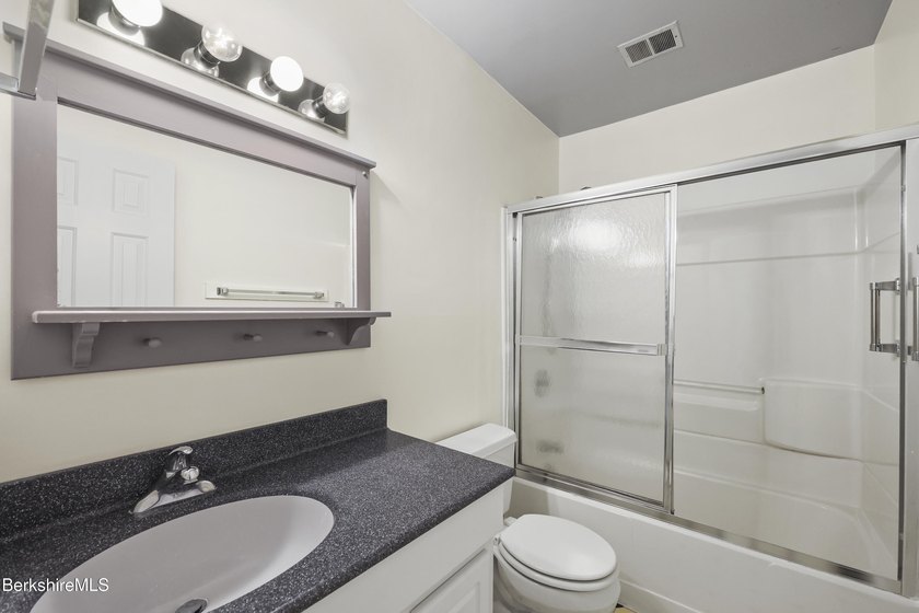 Enjoy easy Berkshire living in this spacious end-unit condo at - photo 22