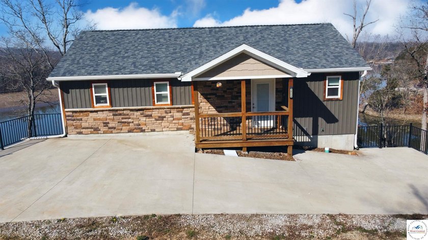 This 3-bedroom, 2.5-bath lakefront home offers over 2,000 square - photo 2