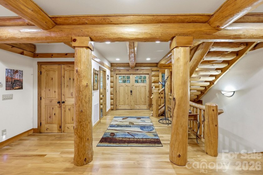 Stunning custom log home nestled on over 3 acres in the shadow - photo 6