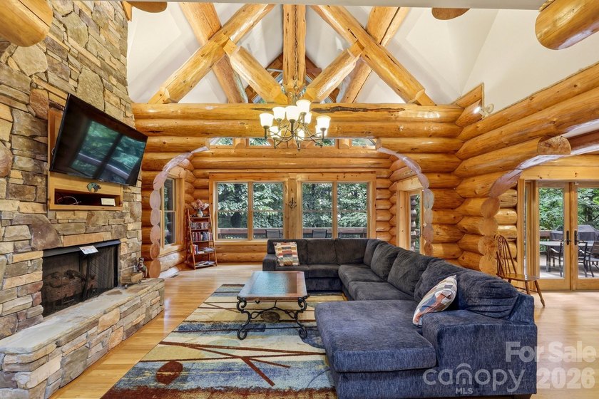 Stunning custom log home nestled on over 3 acres in the shadow - photo 7