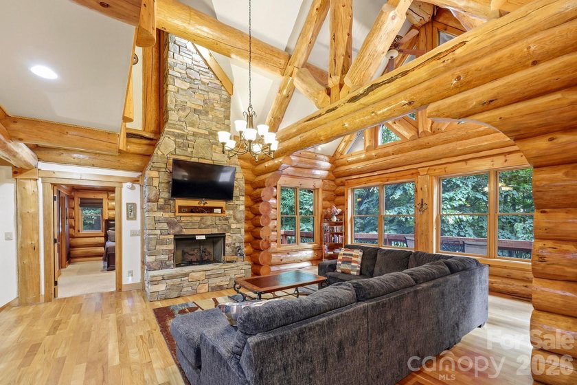 Stunning custom log home nestled on over 3 acres in the shadow - photo 8