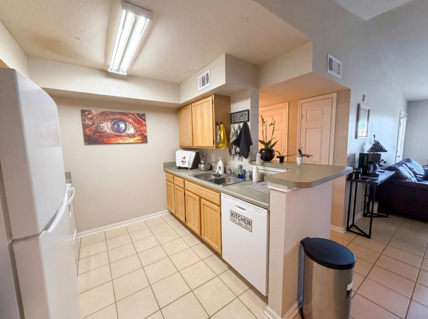 Investor Ready - Indian Lake Condo! This 3-bedroom, 2-bath - photo 3