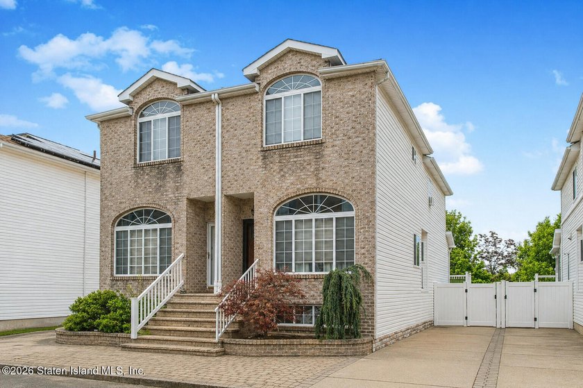 Welcome to this beautifully upgraded semi-attached home in the - photo 3