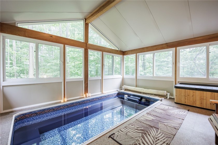 Welcome to this sprawling 2005-built ranch, privately nestled on - photo 22