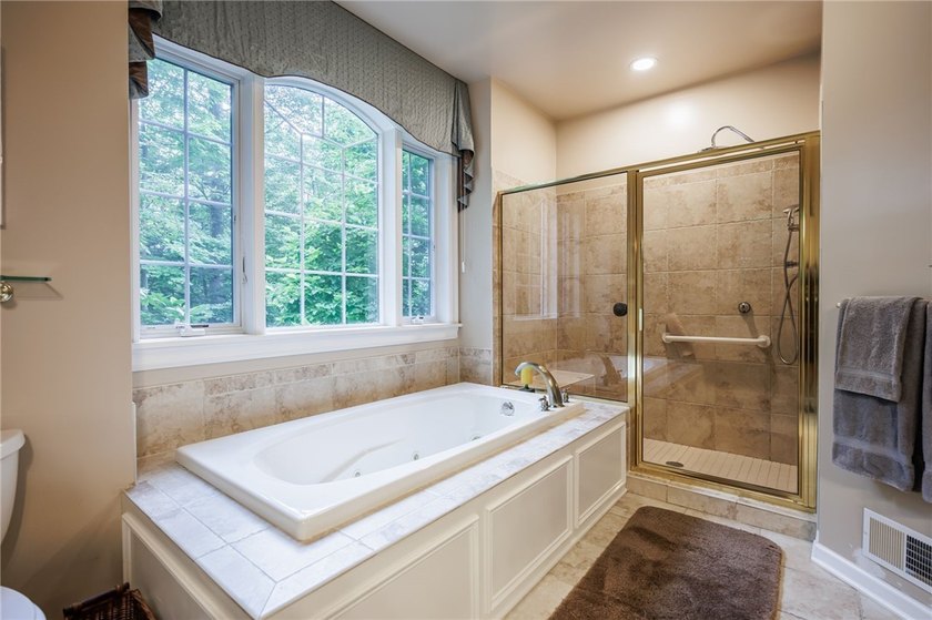 Welcome to this sprawling 2005-built ranch, privately nestled on - photo 25