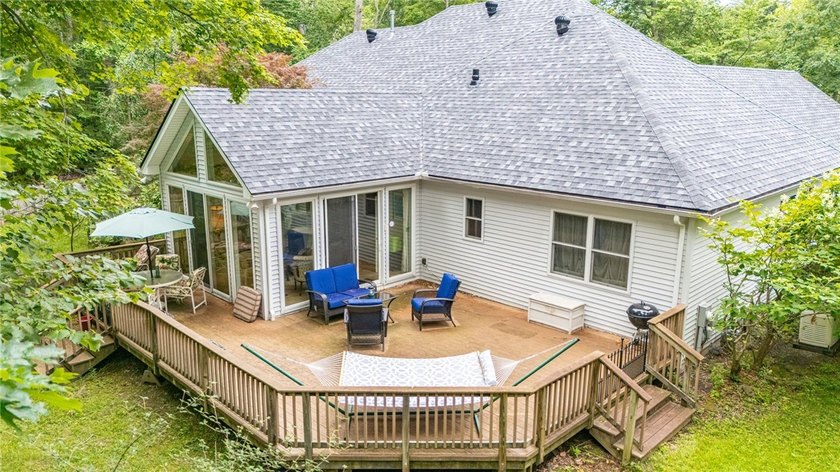 Welcome to this sprawling 2005-built ranch, privately nestled on - photo 32