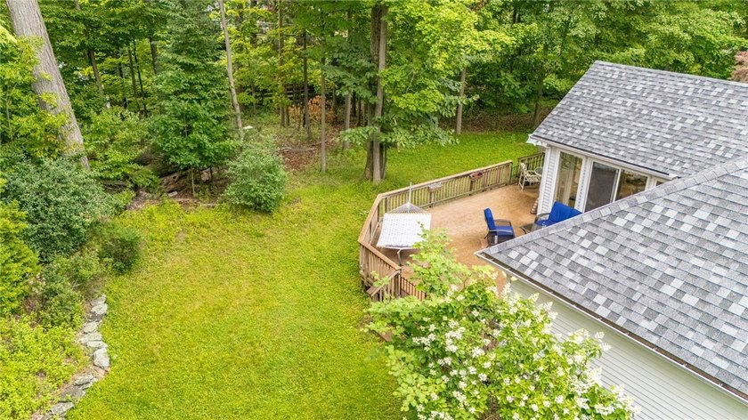 Welcome to this sprawling 2005-built ranch, privately nestled on - photo 34