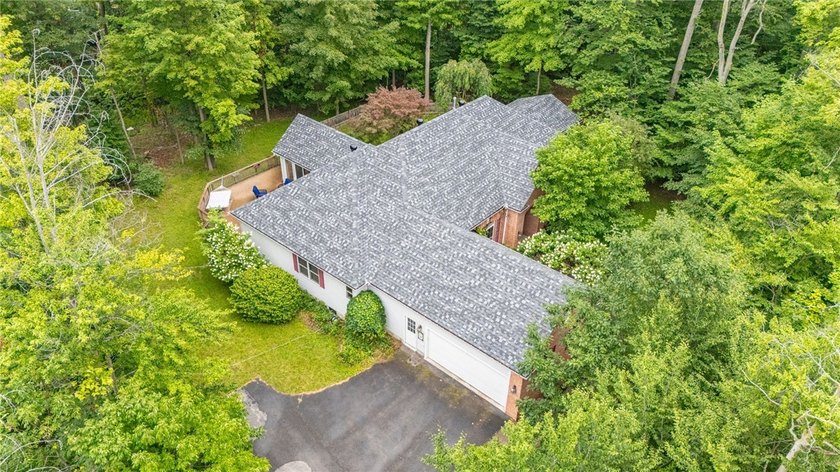 Welcome to this sprawling 2005-built ranch, privately nestled on - photo 35