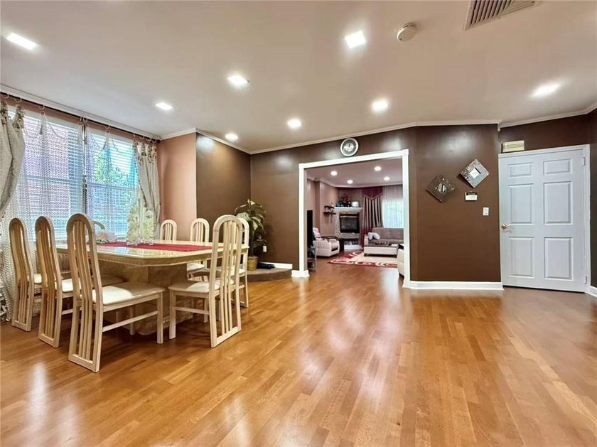 Stunning detached two-family home situated in the highly - photo 3