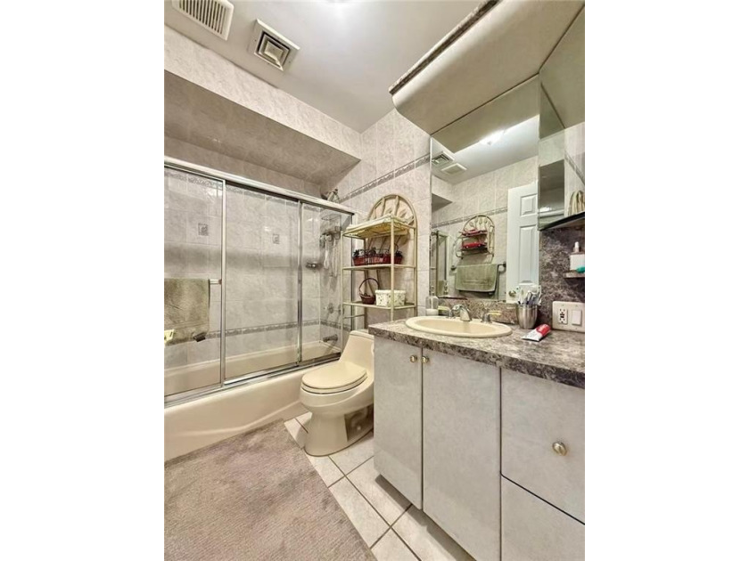 Stunning detached two-family home situated in the highly - photo 8