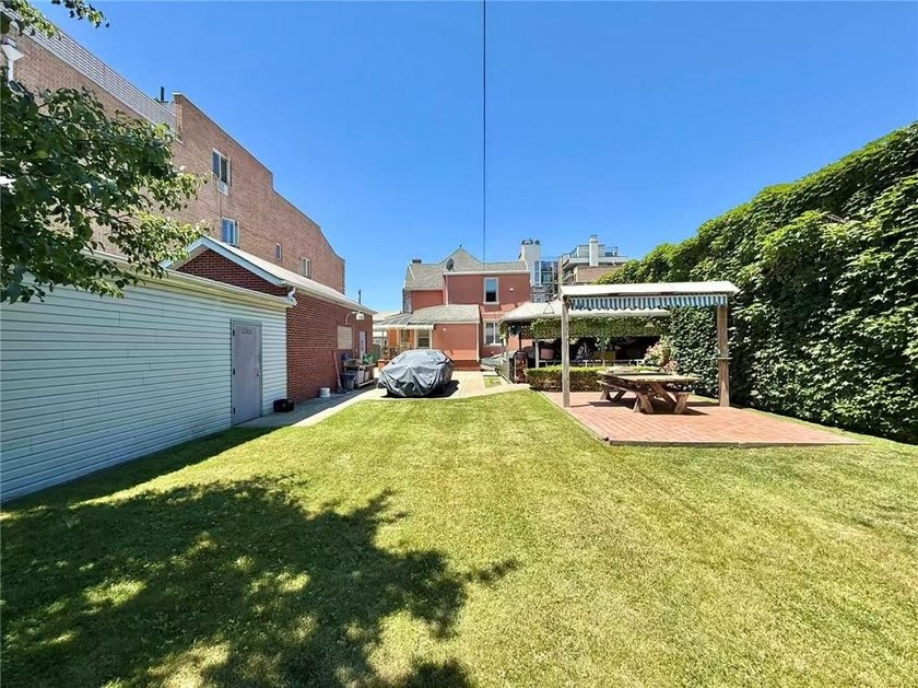 Stunning detached two-family home situated in the highly - photo 10