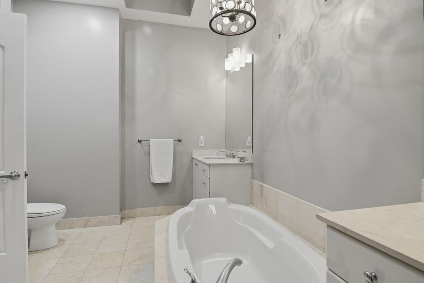 This impeccably maintained loft delivers the perfect blend of - photo 16