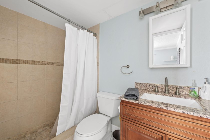 Welcome to this beautifully renovated 2-bedroom, 2-bathroom - photo 10