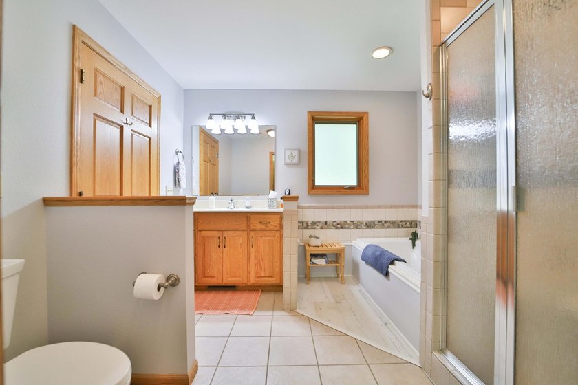 Four-bedroom, three-bathroom home with a two-stall garage - photo 19