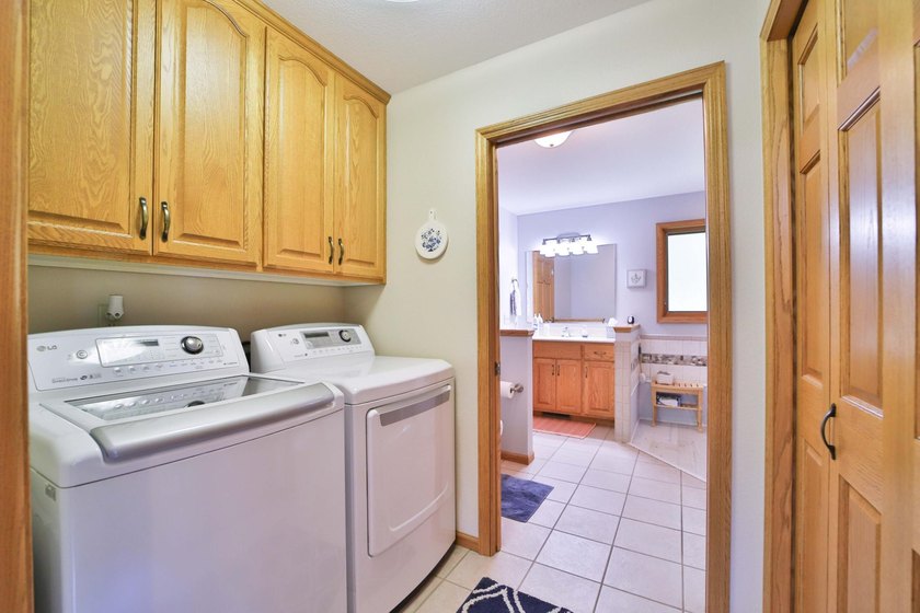 Four-bedroom, three-bathroom home with a two-stall garage - photo 21