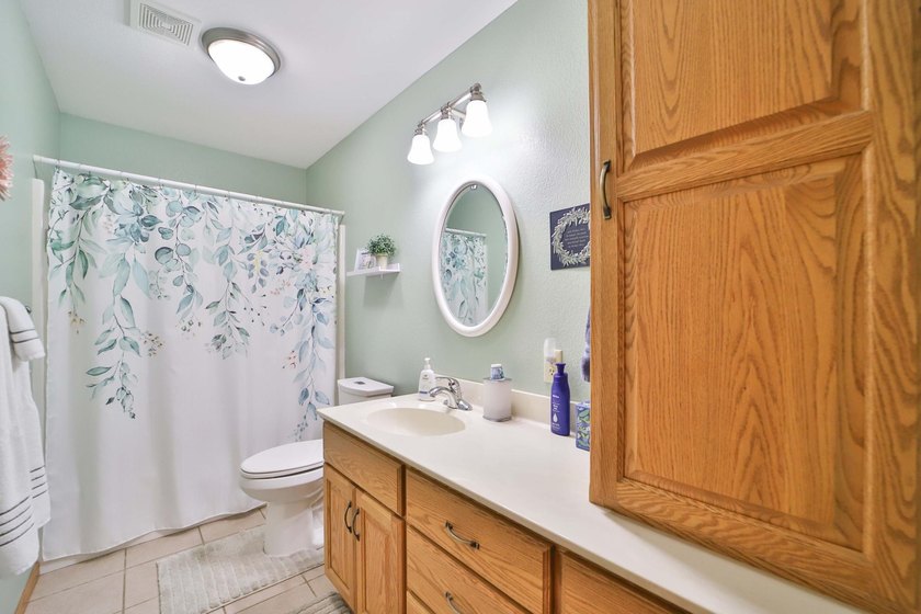 Four-bedroom, three-bathroom home with a two-stall garage - photo 26