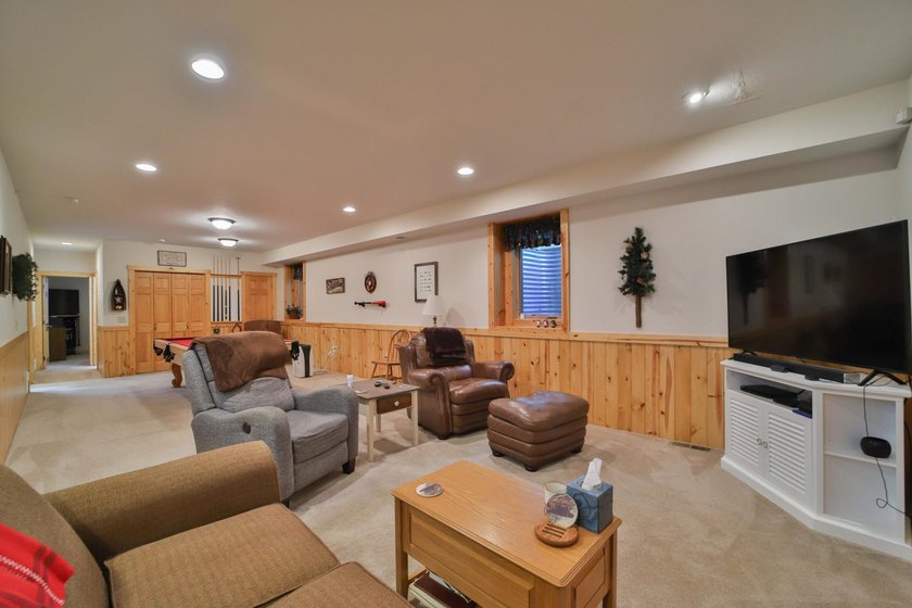 Four-bedroom, three-bathroom home with a two-stall garage - photo 35