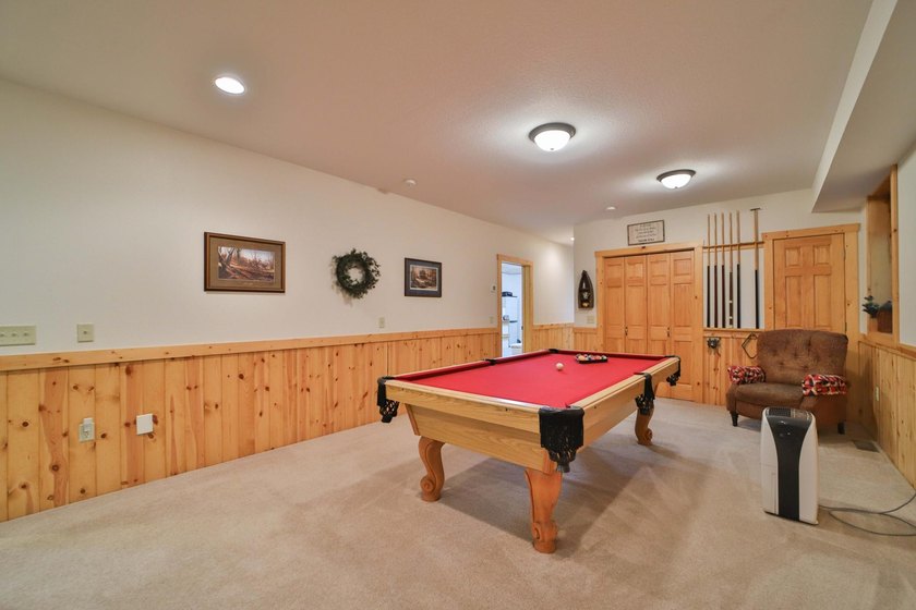 Four-bedroom, three-bathroom home with a two-stall garage - photo 37
