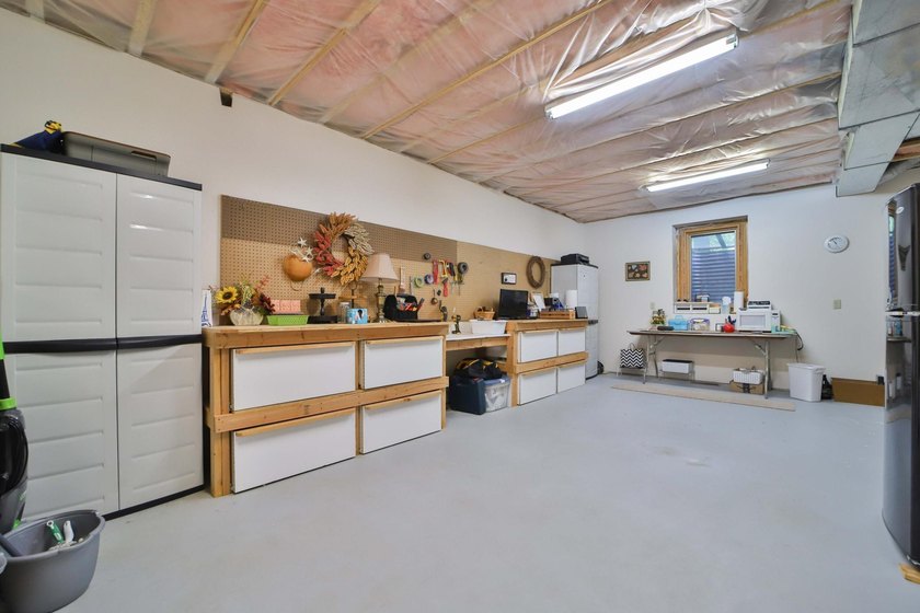 Four-bedroom, three-bathroom home with a two-stall garage - photo 39