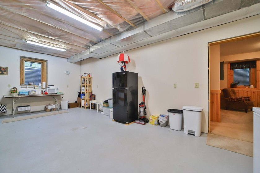 Four-bedroom, three-bathroom home with a two-stall garage - photo 40