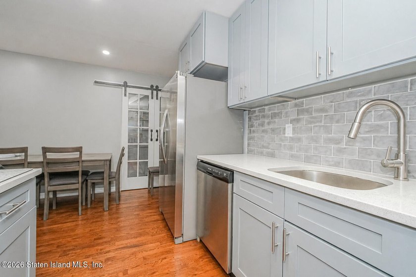 Experience modern living at its finest in this fully renovated - photo 9
